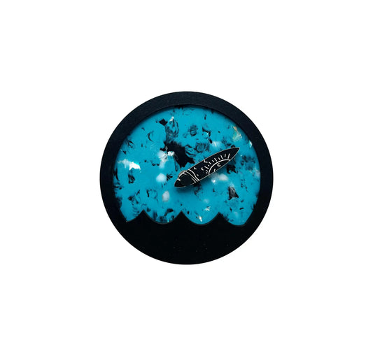 Horloge des marées bleu, ronde avec une petite vague noir en surimpression
