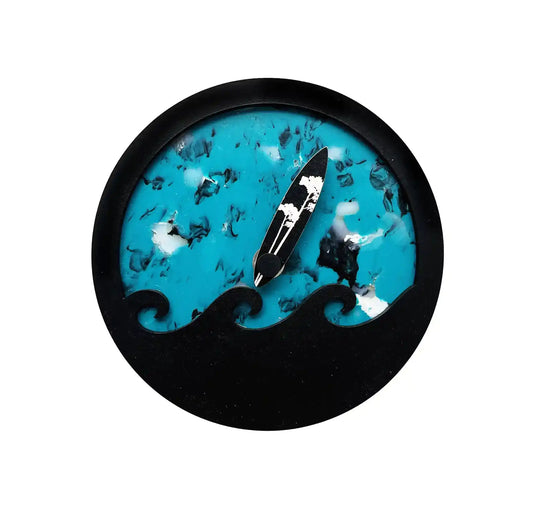 Horloge des marées bleu, ronde avec une vague noir en surimpression